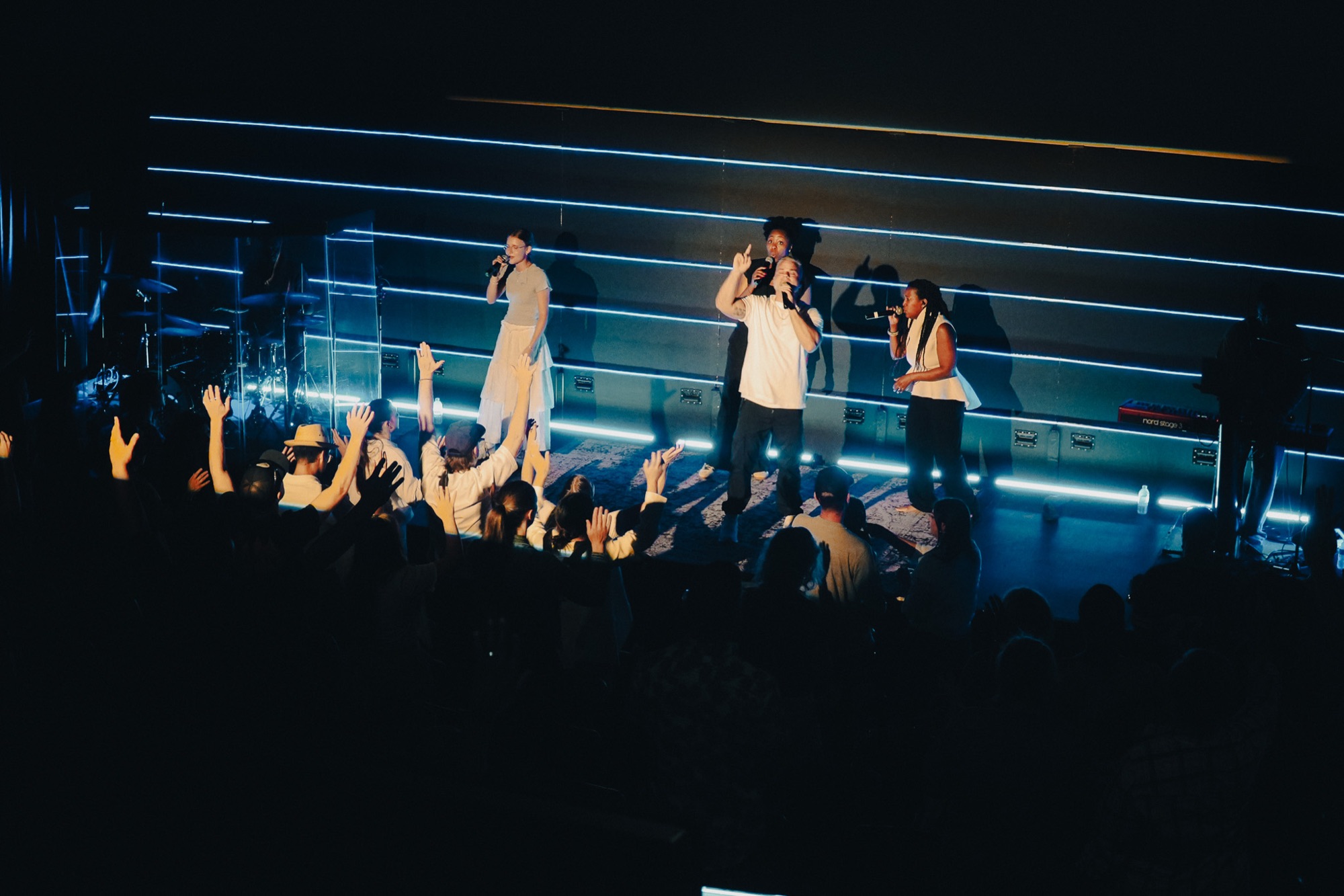 Hands raised in worship at Kingdom Culture
